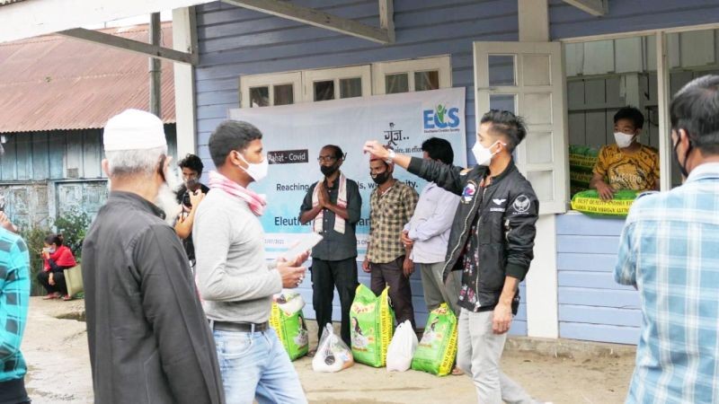 Beneficiaries collect food packets distributed by ECS (Eleutheros Christian Society), Tuensang in collaboration with Goonj (an NGO based out of New Delhi) on July 2 and 3.